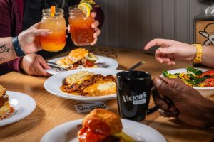 Commercial lifestyle photography capturing authentic moments in a restaurant environment for brand storytelling