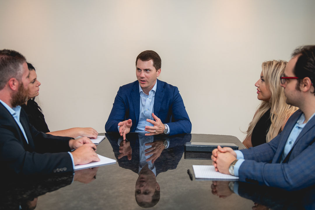 Candid corporate meeting photographed inside a New York City office