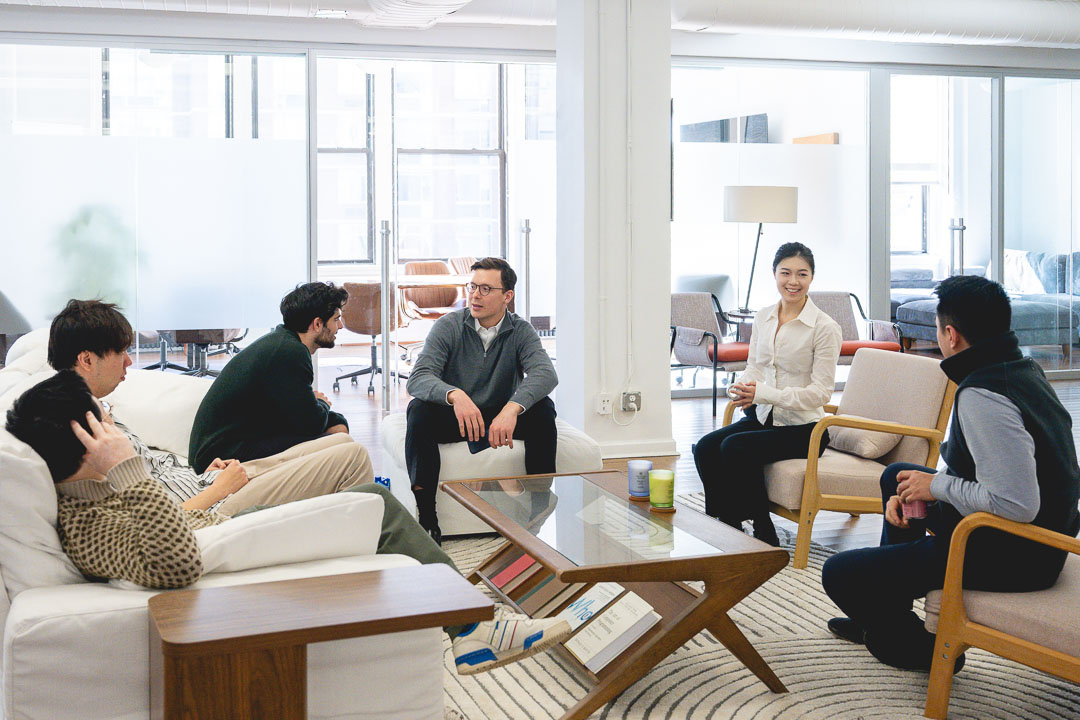Corporate Team Working in Modern NYC Office Environment During Branded Lifestyle Photography Session