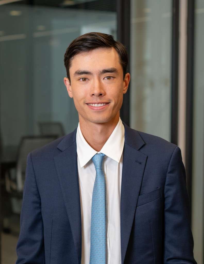 Environmental headshot photographed in the workplace to reflect the professional’s role, personality, and work environment.